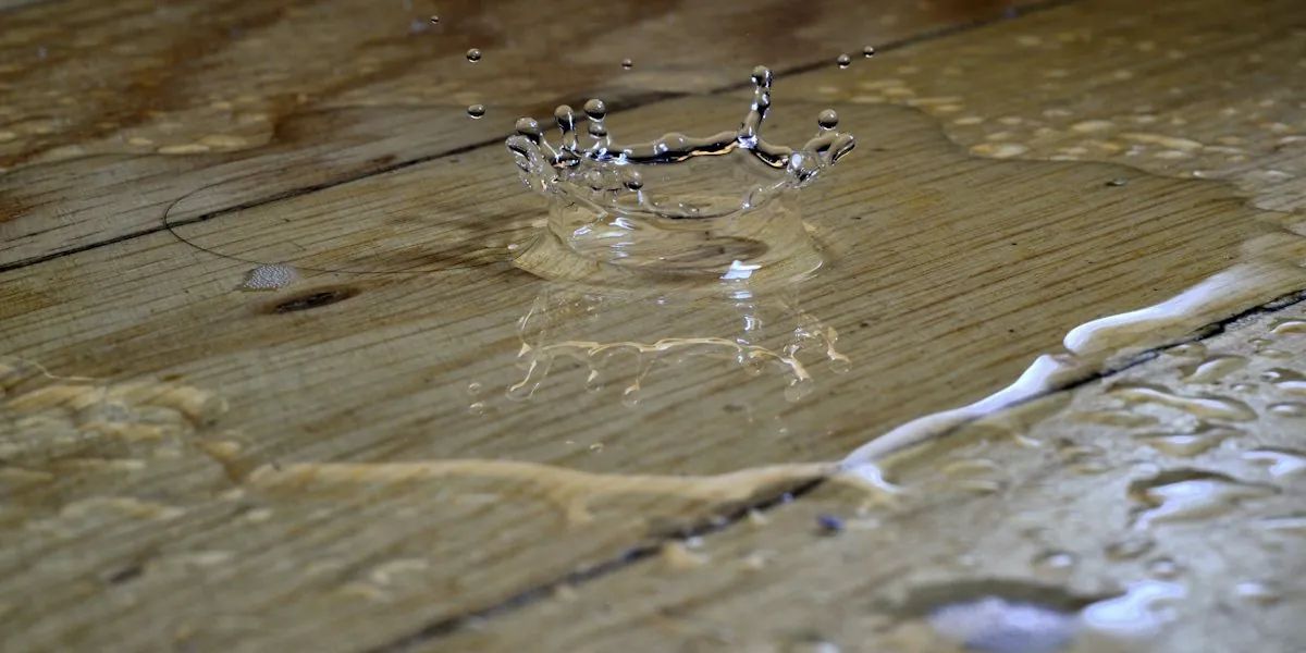 Water pooling across an indoor floor